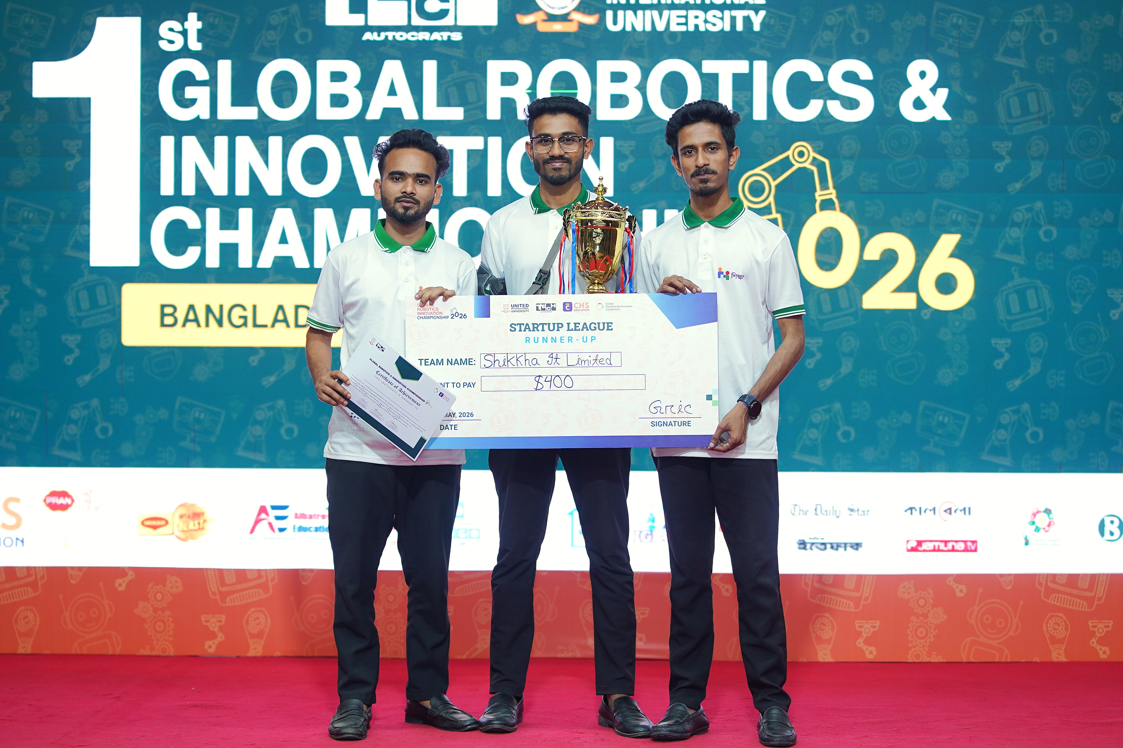 Our team with the Startup League runner-up trophy and award